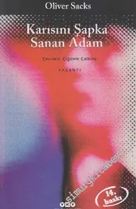 Karısını Şapka Sanan Adam -