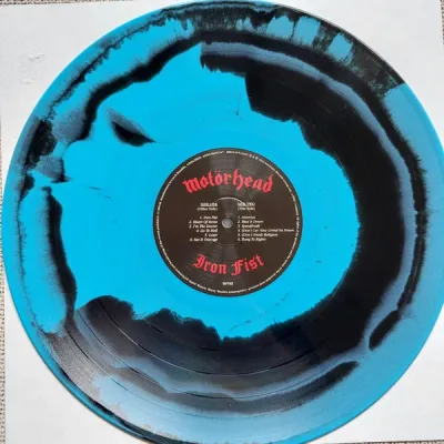 Motörhead – Iron Fist (Blue & Black Swirl, 40th Anniversary Vinyl) LP Motörhead – Iron Fist (Blue & Black Swirl, 40th Anniversary Vinyl) LP