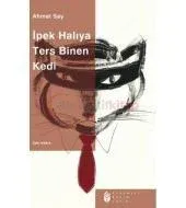 İpek Halıya Ters Binen Kedi